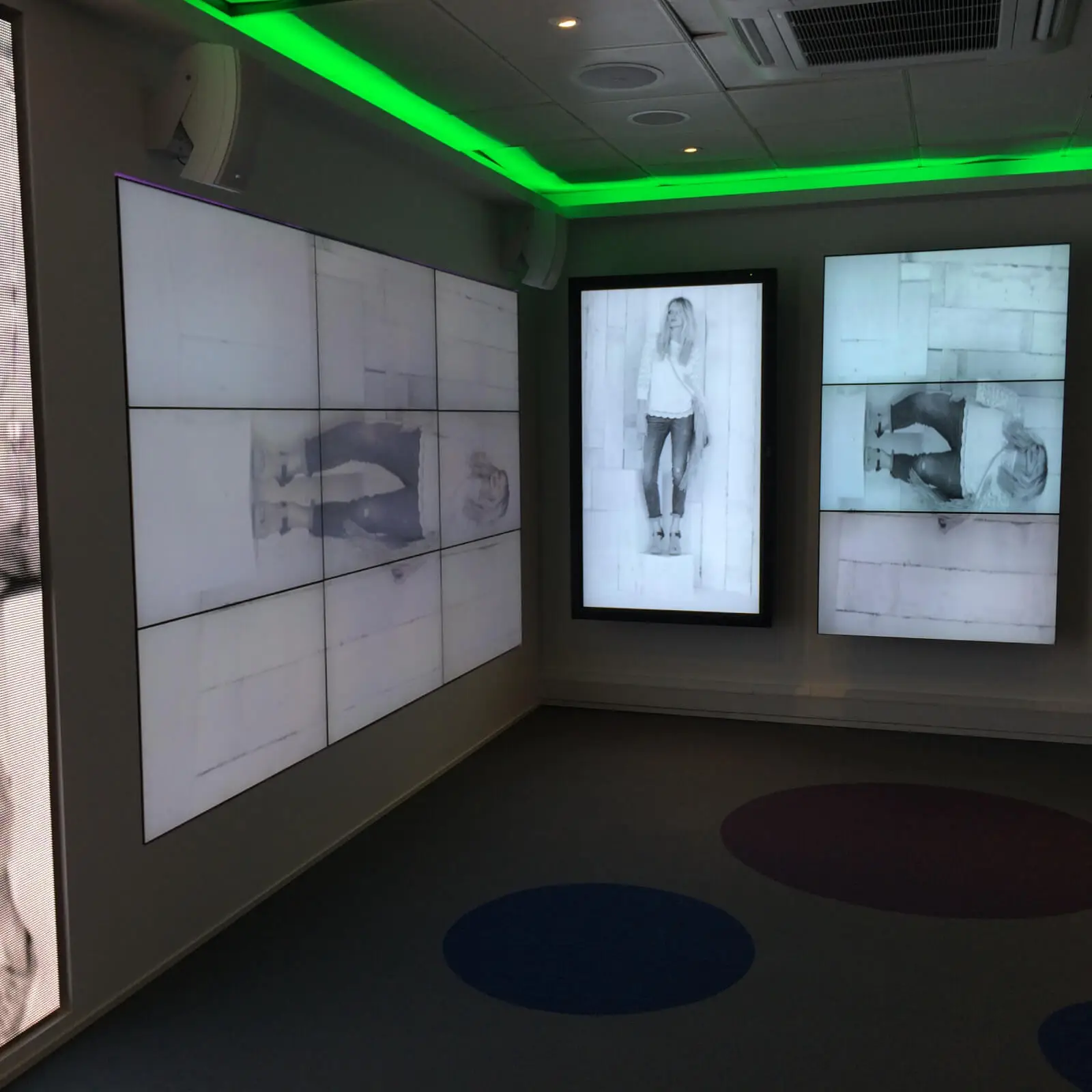 PEL UK Offices space with designer furniture and wall mounted digital screens 2